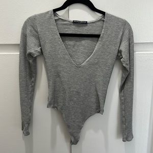Grey long sleeve bodysuit